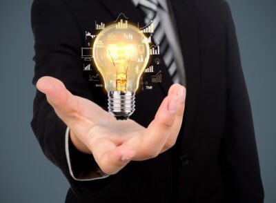 businessman-with-light-bulb-his-hand_1232-891